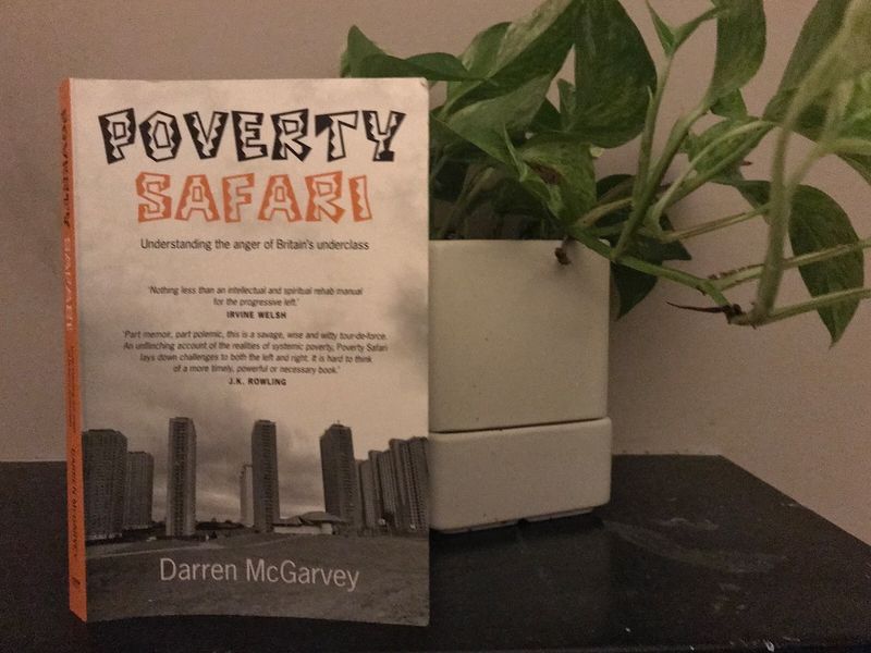 A photo of the book Poverty Safari by Darren McGarvey sitting on a mantelpiece